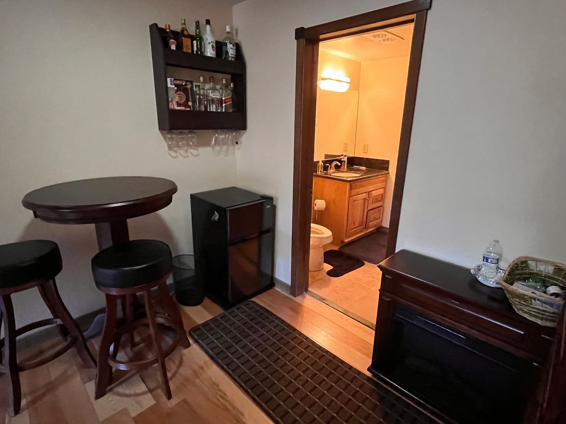Gameroom bar, full bath and Laundry (downstairs)