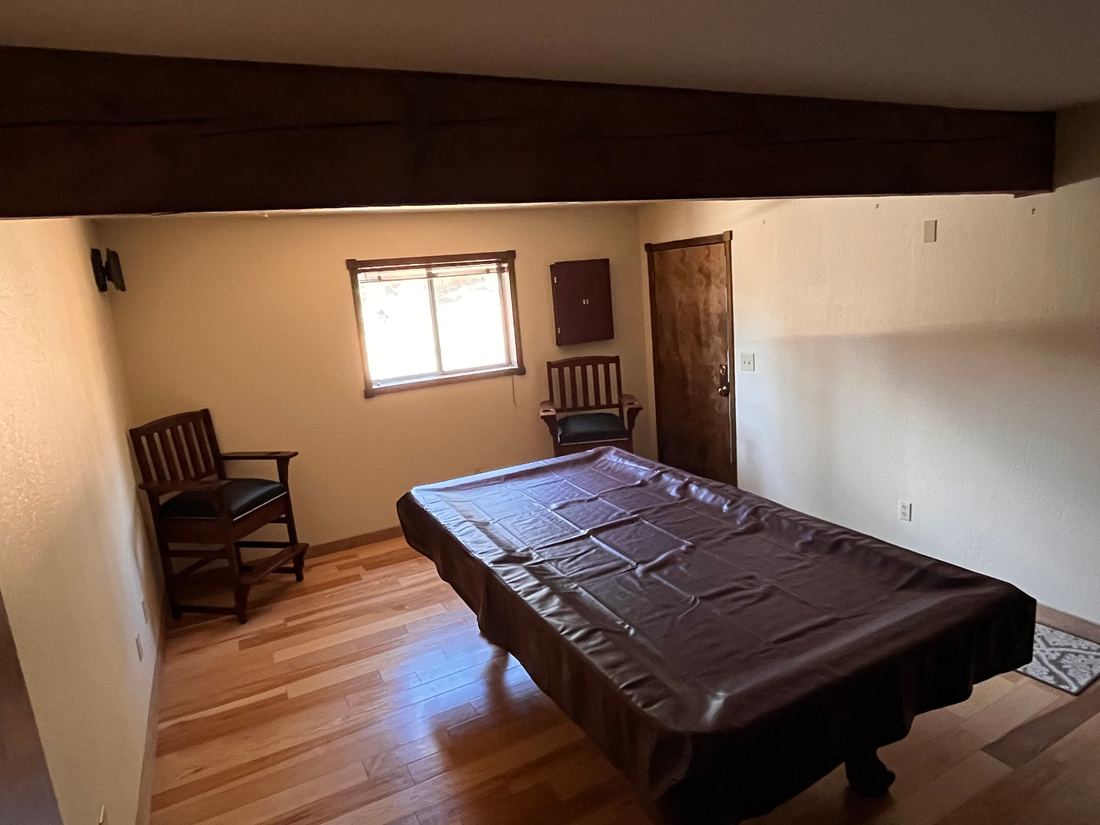 Game room (with adjacent Bathroom) - downstairs